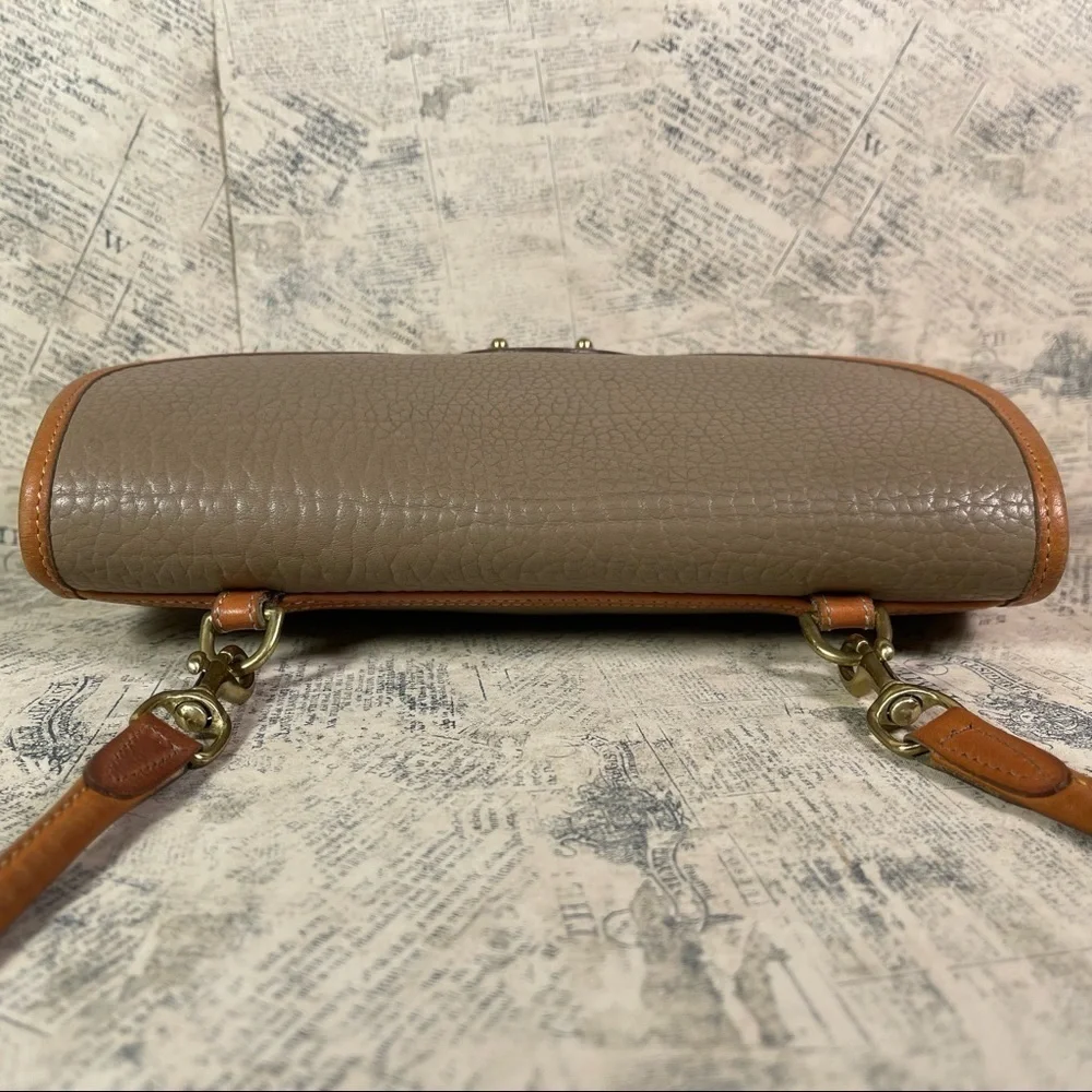 Vintage Dooney & Bourke All Weather Leather Cavalry Pochette R77